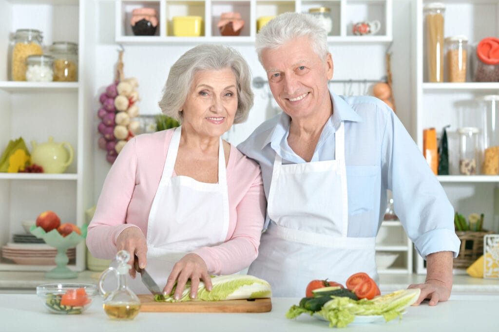 senior man and woman in the kitchen